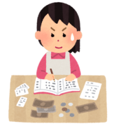 家計簿をつける女性